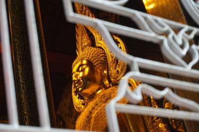 Statue of buddha outside building