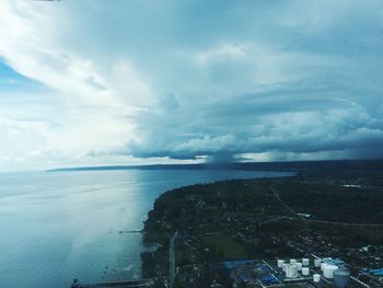 Scenic view of sea against cloudy sky