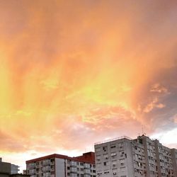 High section of building against cloudy sky