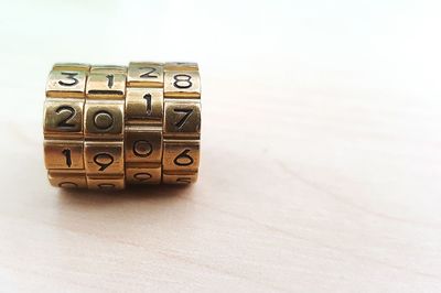 Close-up of coins on table