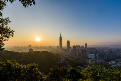 View of buildings against sky during sunset