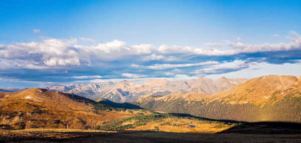 Panoramic view of landscape and mountains against sky