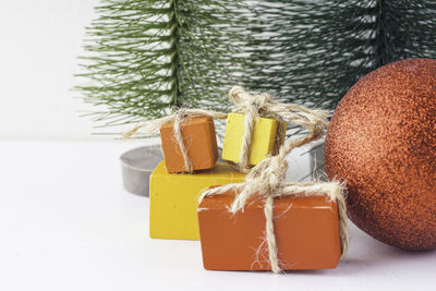 Close-up of cake in box on white background