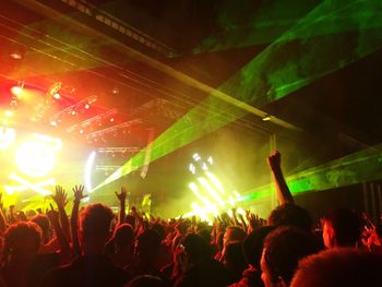 People enjoying at concert