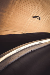 High angle view of road by electric lamp on wall