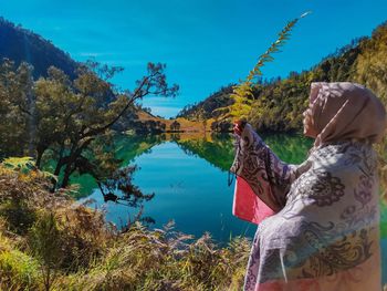 Scenic view of lake by trees