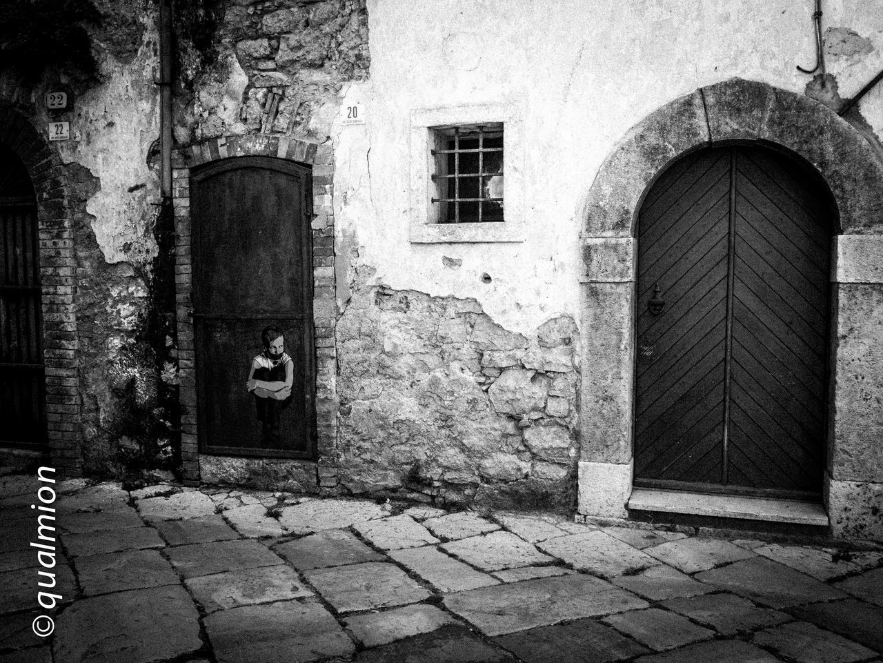 EXTERIOR OF OLD BUILDING BY WALL