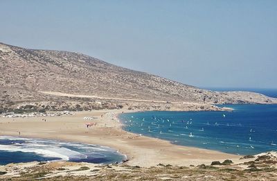 Scenic view of sea against clear blue sky