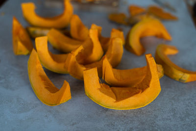 High angle view of yellow chili peppers on table