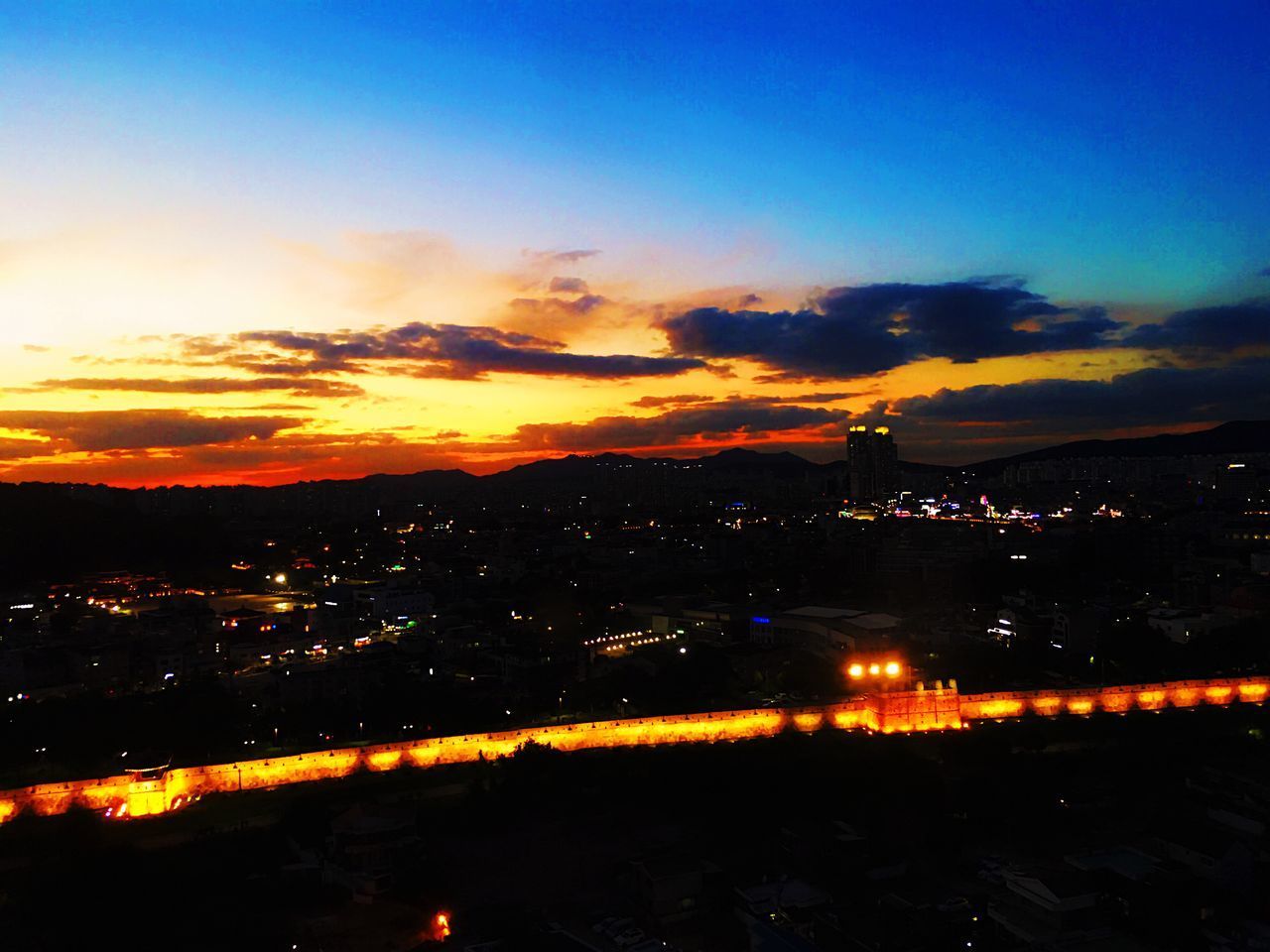 VIEW OF CITY AT NIGHT