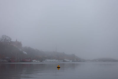 Boat in sea against sky