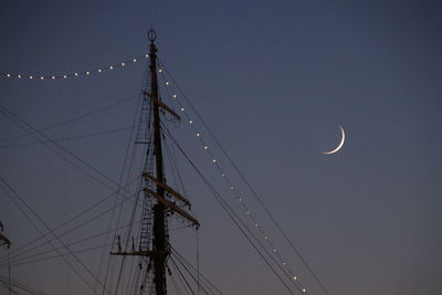 Low angle view of sailboat against sky at night