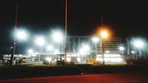 Illuminated street lights at night