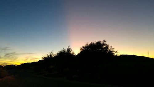 Scenic view of landscape at sunset