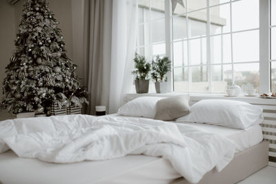 White flowers on bed at home