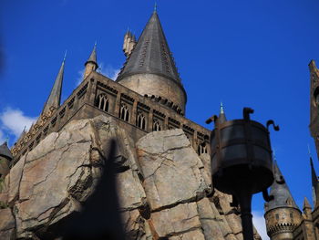 Low angle view of cathedral against clear blue sky