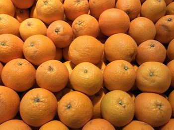 Full frame shot of oranges in market