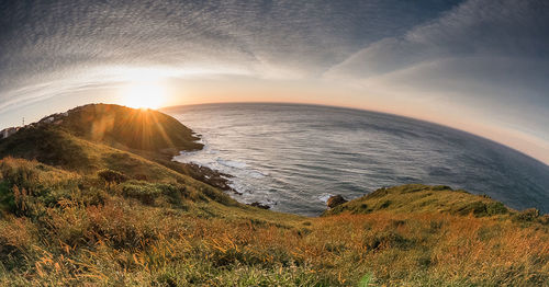 Scenic view of sea against sky during sunset