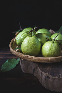 Close-up of fruits on wooden table