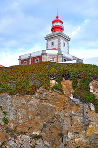 Low angle view of lighthouse against sky