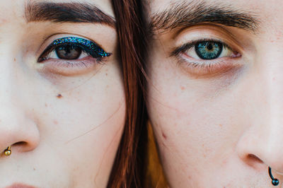 Close-up of cropped man and woman