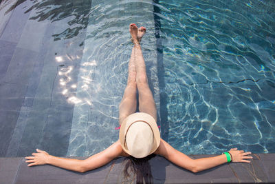 Woman swimming in pool