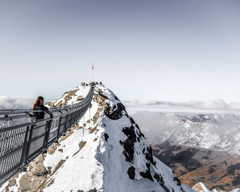 Scenic view of snow covered mountain against sky