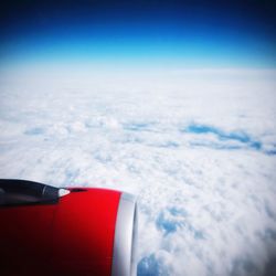 Low angle view of cropped car against sky