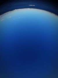 Low angle view of swimming pool against clear sky