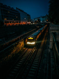 Railroad tracks at night