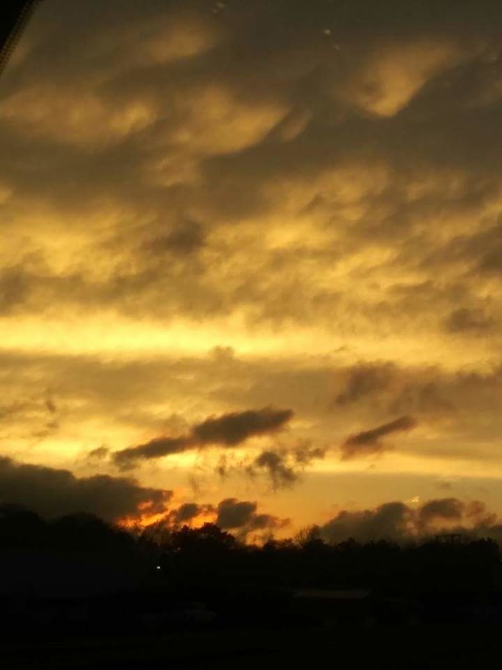 SCENIC VIEW OF DRAMATIC SKY OVER SILHOUETTE LANDSCAPE