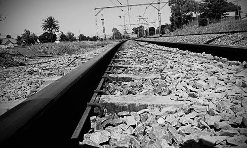 Railroad tracks against clear sky