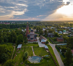 High angle view of buildings against sky at sunset