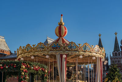 Moscow, russia -  people on colorful merry go round on christmass and new year holidays.