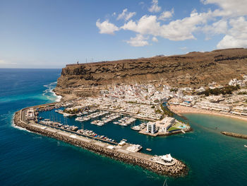 High angle view of sea shore against sky