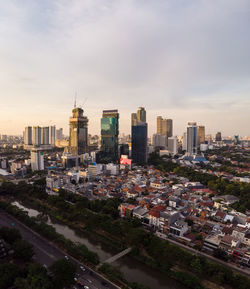 High angle view of buildings against sky in city