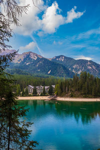 Scenic view of lake and mountains against sky