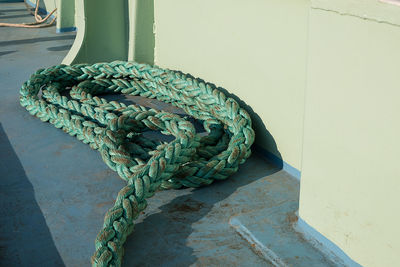 Close-up of rope tied on wall