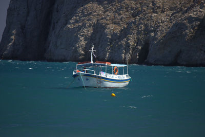 Boat moored in sea