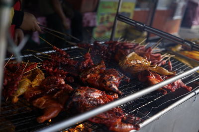 Close-up of meat on barbecue grill