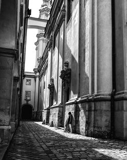 Narrow street amidst buildings