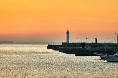 Scenic view of sea against sky during sunset