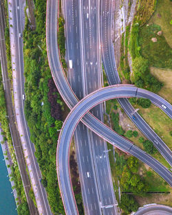 High angle view of elevated road amidst trees in city