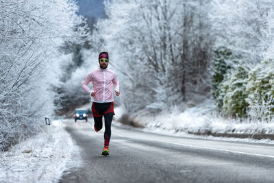 Man running on road