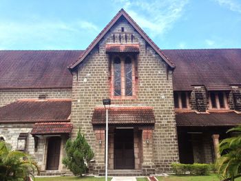 Low angle view of old building against sky