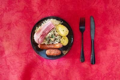 Close-up of breakfast in plate on table