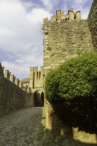 View of historic building against cloudy sky