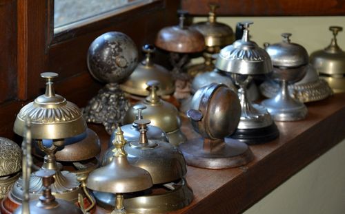 High angle view of various bells on table