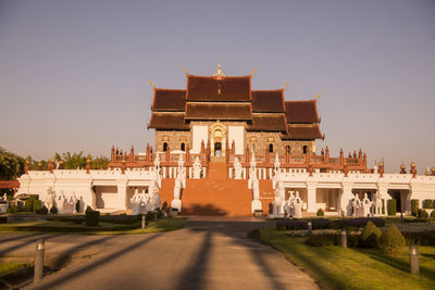 Facade of historic building against clear sky