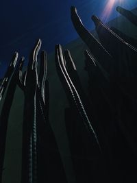 Low angle view of silhouette boat in sea against sky